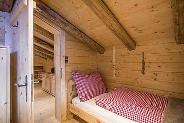 Ferienhaus in Kelchsau - Blick in ein Schlafzimmer