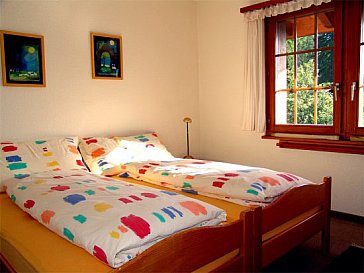 Ferienwohnung in Bellwald - Schlafzimmer mit Doppelbett