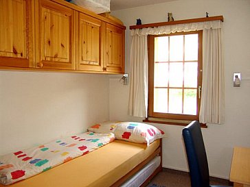 Ferienwohnung in Bellwald - Schlafzimmer mit Einzelbetten