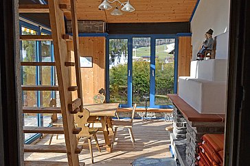 Ferienhaus in Kals am Grossglockner - Wintergarten mit offenem Kamin