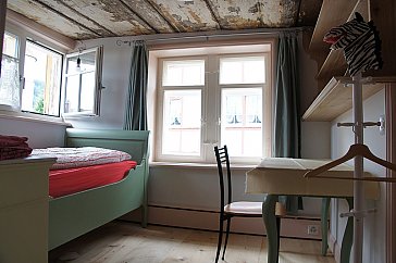 Ferienwohnung in Appenzell - Nebenzimmer mit Einzelbett und Tischchen