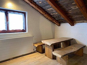 Ferienwohnung in Flumserberg-Tannenboden - Sitzecke im oberen Schlafzimmer