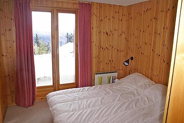 Ferienhaus in Les Collons - Schlafzimmer mit Doppelbett