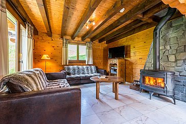 Ferienhaus in Châtel - Wohnbereich mit Schwedenofen